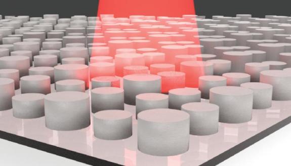 An illustration of a dielectric metamaterial with infrared light shining on it.