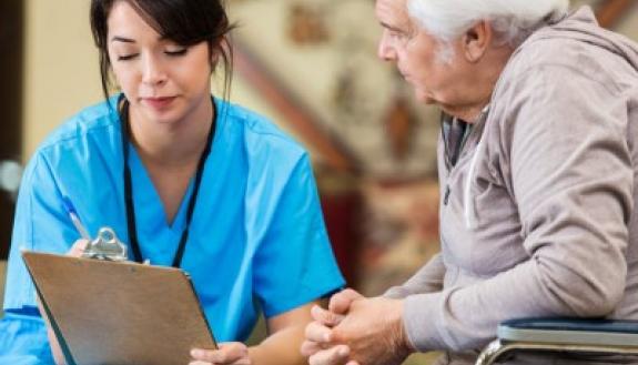 Nurse with older patient