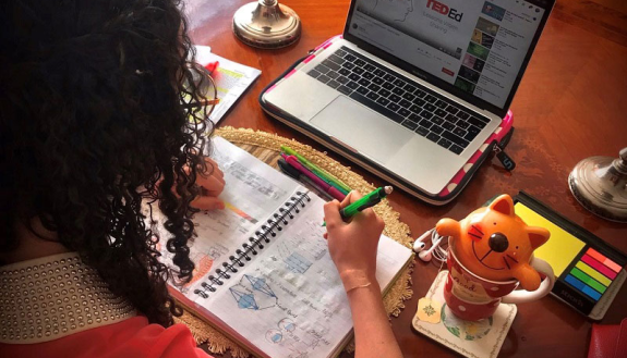 stock image of student learning online