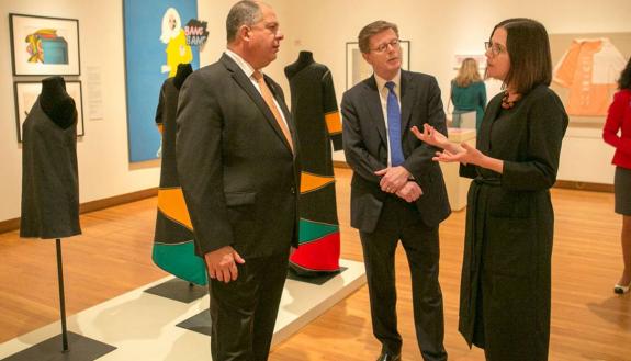 The former president of Costa Rica and Duke President Vincent Price discuss Latin American and Latino/a art with Romance Studies professor Esther Gabara during a visit to the exhibit she curated for the Nasher Museum of Art. Recent funding from The Duke E