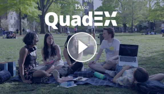 students sitting on a quad
