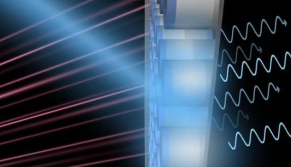 Artistic representation of the new metasurface technology. Rays of light (red) bombard the silicon cylinders, changing their electromagnetic properties to precisely tune how they interact with electromagnetic waves.