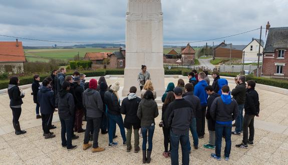 students discuss World War I while visiting the Chateau Thierry American Monument