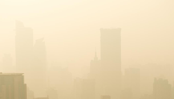 Photo of smog covering city downtown skyline