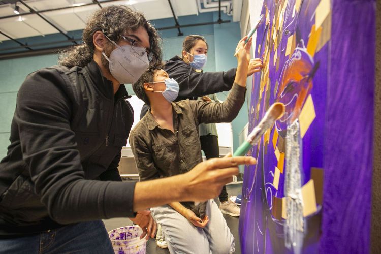 Students prepare an art piece for Race, Place and Compassionate Space