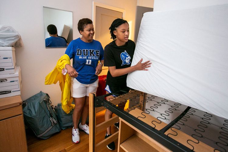 Demi Wilson of Charlotte moves into Pegram Residence Hall as her mom, Bridget, helps. “I’m just ready to start something new, to explore and get out of my comfort zone,” Wilson said. “This is the best place for me to do that.”