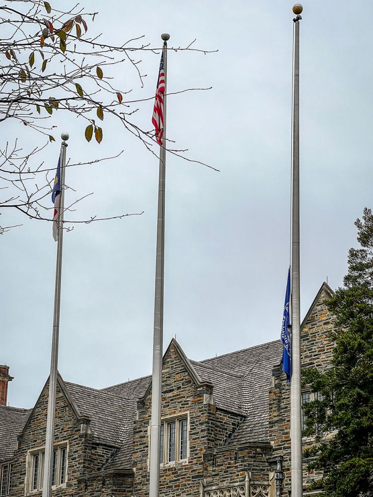 The Duke flag is lowered Tuesday in memory of the students killed in the University of Virginia shooting. Photo by Bill Snead.