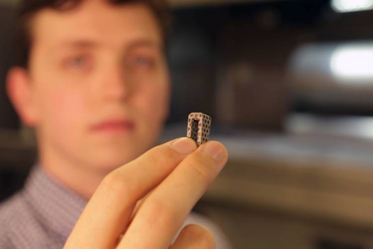 A long learning curve: The lab's titanium 3D metal printer required students to make designs that could never be fabricated by traditional manufacturing processes.