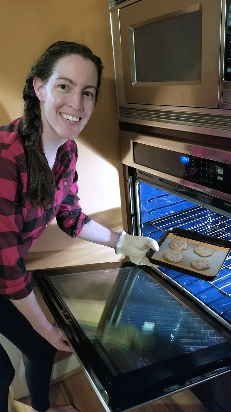 Blythe Tyrone pulls her chocolate chip cookies out of the oven. Photo courtesy of Blythe Tyrone.