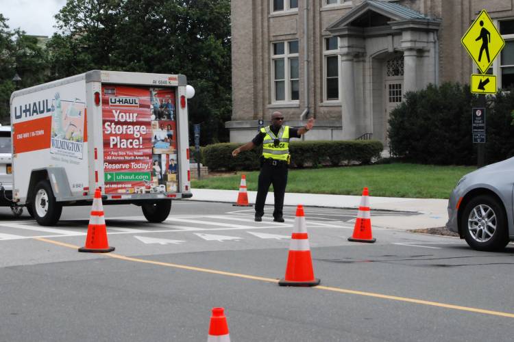 Duke Police Officer Eric Russell directs traffic on East Campus. 