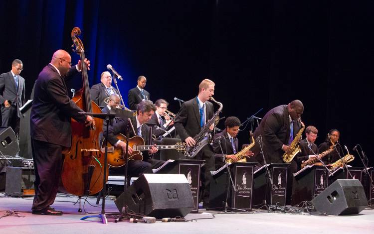 John V. Brown, far left, performs with Duke students at the Durham Performing Arts Center.