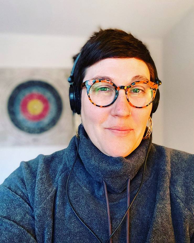 Julie Maxwell wears headphones to listen to her Motivation for Spring 2021 playlist. Photo courtesy of Julie Maxwell.