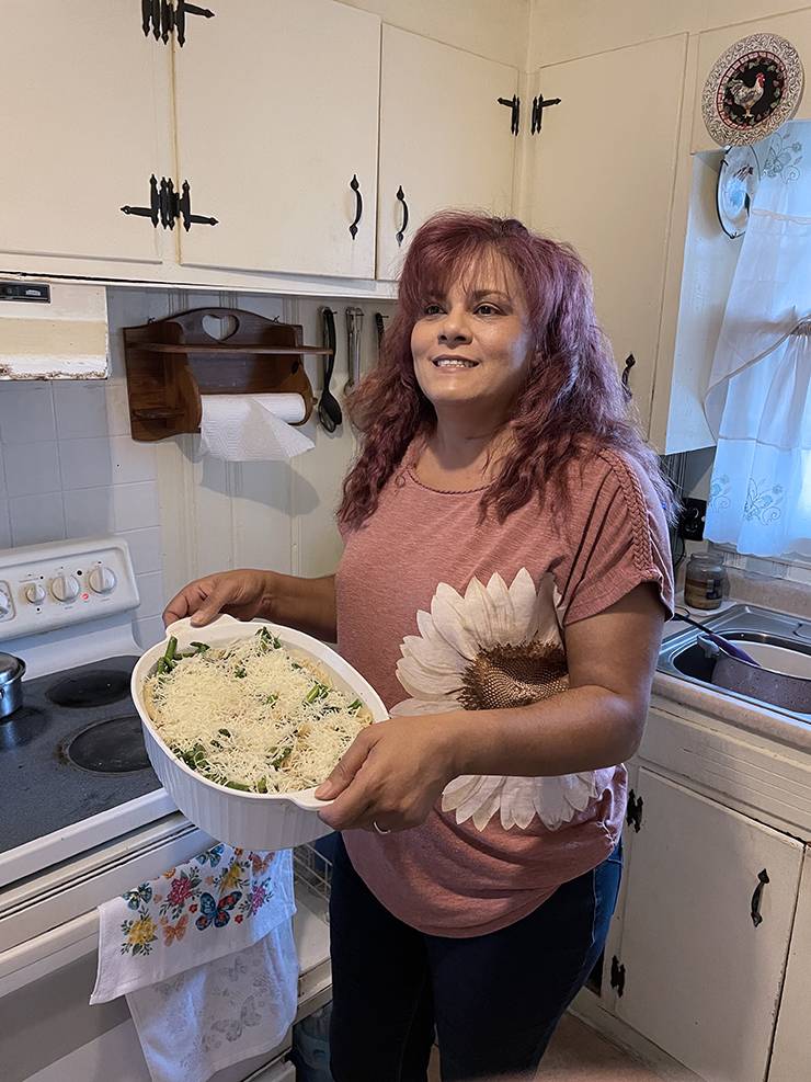 Karen Locklear holds her cheesy chicken and asparagus pasta bake. Photo courtesy of Karen Locklear.