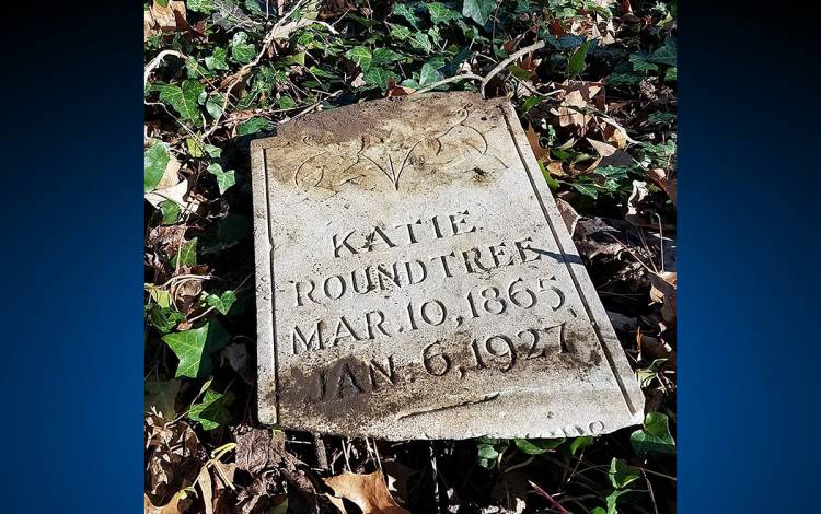 Many headstones in Geer Cemetery have been damaged or knocked over. Friends of Geer Cemetery is working to preserve the history of the burial ground. Photo courtesy of Duke Service-Learning.