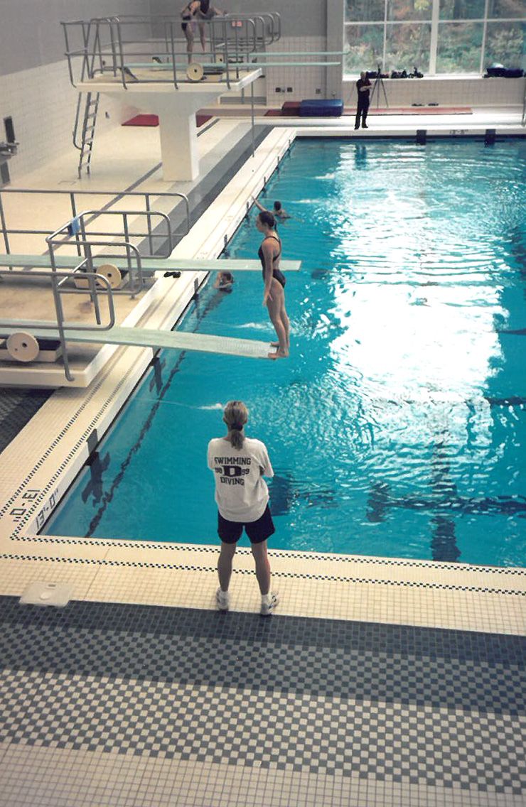 After her college diving days were done, Lindy Norman, seen here standing in the foreground, served as Duke's diving coach. Photo courtesy of Lindy Norman.