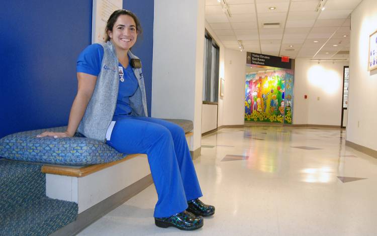Duke University Hospital Nurse Maddie Morales spends most of her on her feet, so her shoes need to provide comfort and durability. Photo by Stephen Schramm.