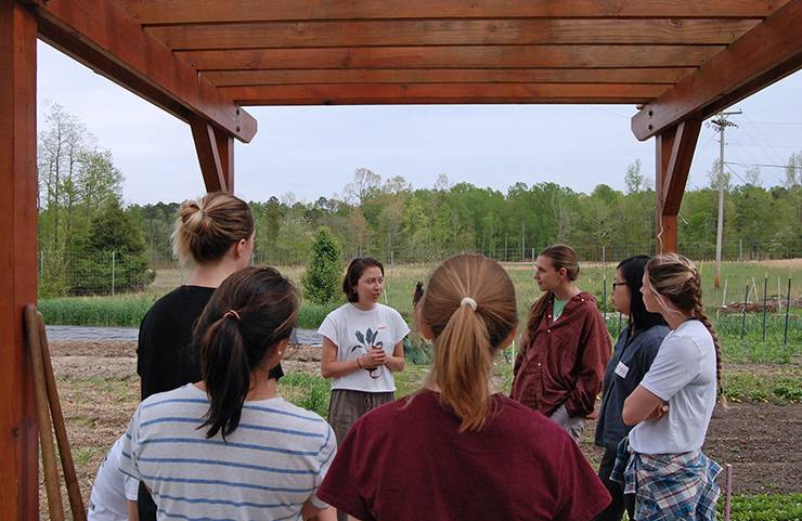 Nathalie Kauz and Sara Snyder lead a tour of the Campus Farm.