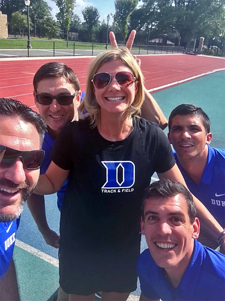 Rhonda Riley, center, with the Duke Cross Country and Track and Field coaching staff. Photo courtesy of Rhonda Riley.