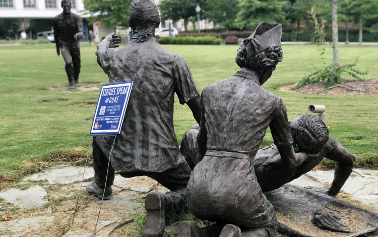 The 65th Commemorative Statue Group sits outside the Duke Medicine Pavilion. The statue commemorates the 65th General Hospital, a group of Duke doctors and nurses who were stationed in England during WW2. Photo by Leanora Minai.