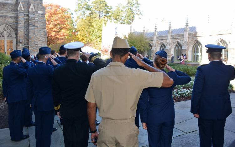 Lt. Levi Blackwell salutes during the Thursday's ceremony. Photo by Stephen Schramm.