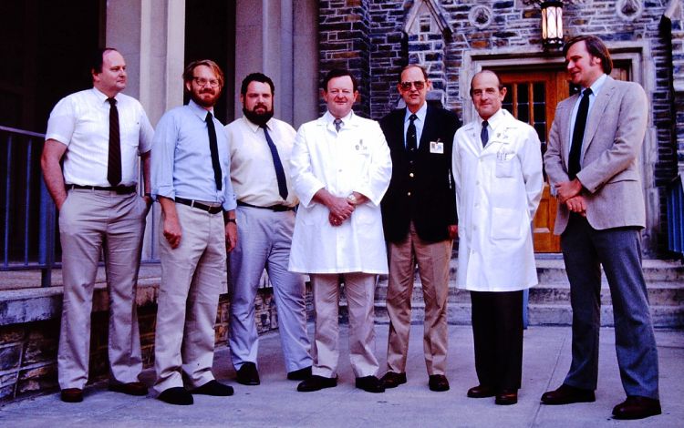 Blake Wilson, far right, stands with members of the Duke-RTI Cochlear Implant Team in the late 1980s. Photo courtesy of Blake Wilson.