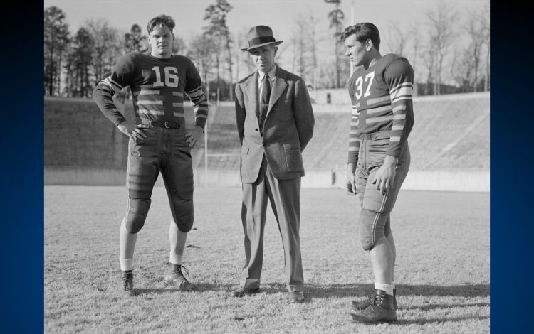 Hired in 1931, Wallace Wade, center, proved to be a transformative coach for Duke Football. Photo courtesy of Duke University Archives.