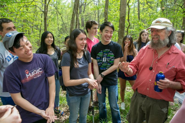 Students in the forest in a Herpetology class
