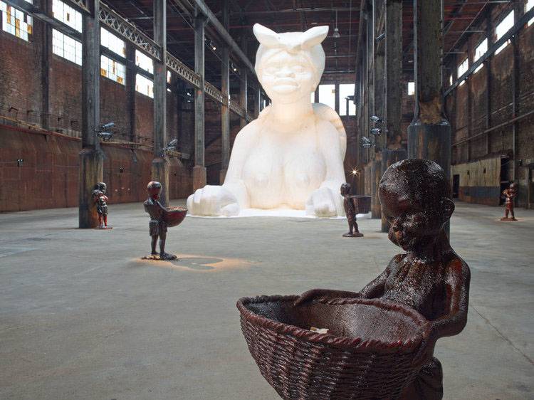 Kara Walker’s A Subtlety: Or… the Marvelous Sugar Baby an Homage to the unpaid and overworked Artisans who have refined our Sweet tastes from the cane fields to the Kitchens of the New World on the Occasion of the demolition of the Domino Sugar Refining Plant."