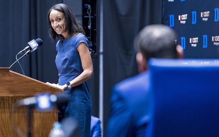Nina King, at the podium, speaks while head coach Mike Krzyzewski watches during the announcement he would retire at the end of the 2021-21 basketball season. Photo courtesy of Duke Athletics.