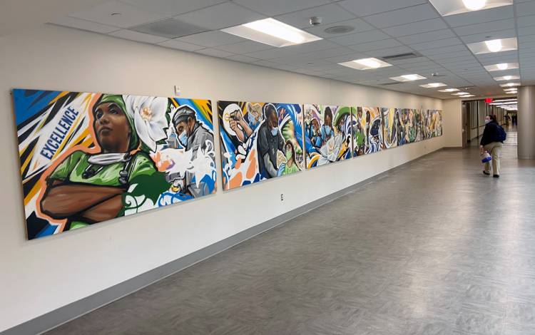 An eight-panel mural in Duke University Hospital honors frontline workers. Photo courtesy of Bill Gregory.