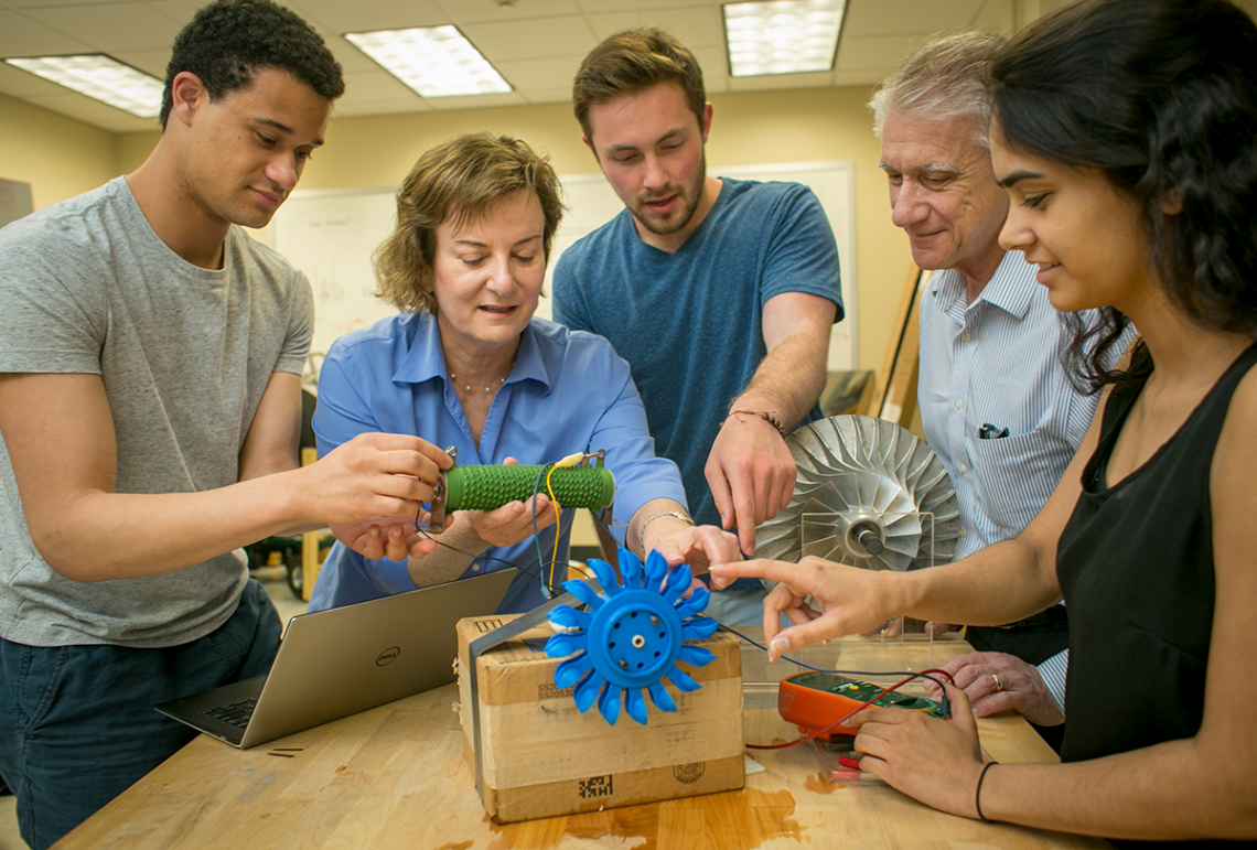 Emily Klein, professor of earth and ocean sciences, and Josiah Knight, associate professor of mechanical engineering and materials science, work with students from the Bass Connections project team “Energy andthe Environment: Design and Innovation.” 