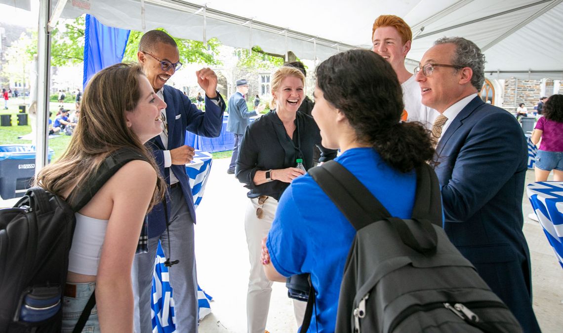 Students and invited guests talk with Gary Bennett, vice provost for undergraduate education, and Mary Pat McMahon, vice provost and vice president of student affairs.