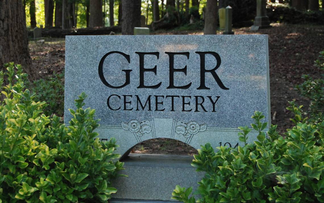 Geer Cemetery was established in 1877 as Durham's first Black cemetery. Now, Duke is playing a part in efforts to reclaim and restore the neglected burial ground. Photo by Jack Frederick.