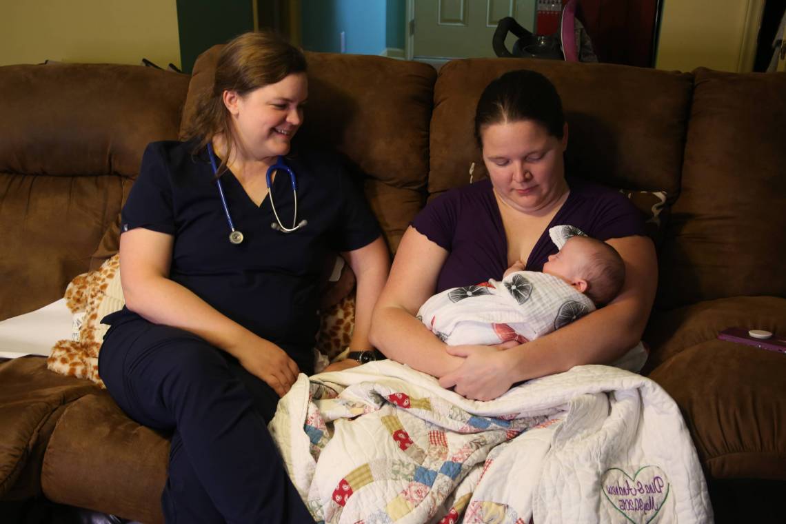 A Family Connects nurse visits with a newborn and new mother. 