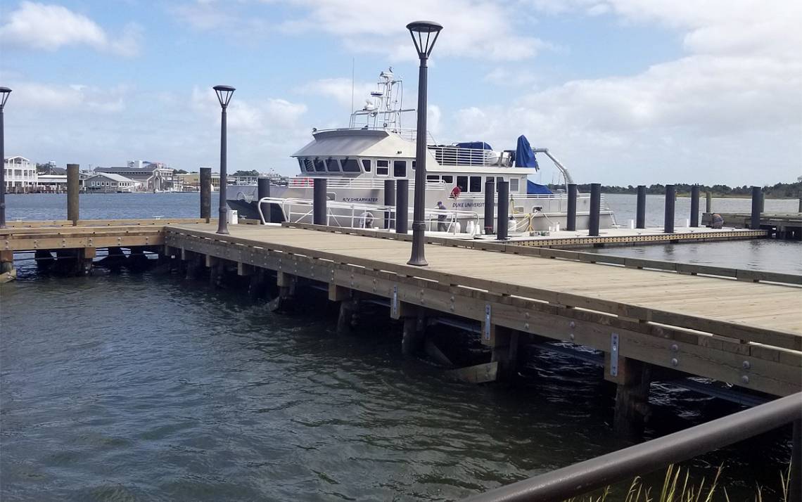 A 125-foot long dock reaches out to the R/V/ Shearwater from the Duke Marine Lab campus in Beaufort.