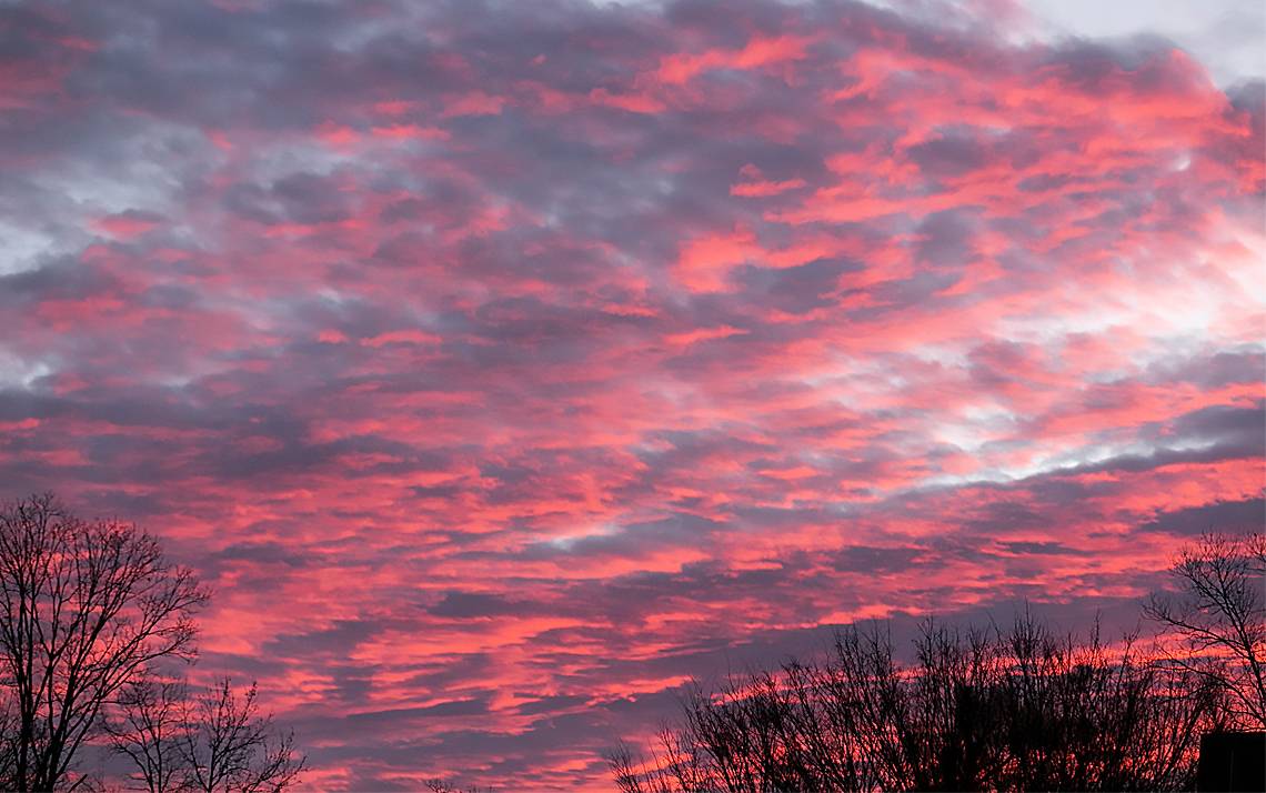 A colorful sky at sunrise.
