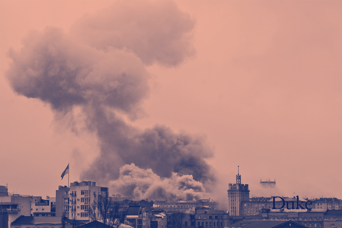 Smoke rises above a city in Ukraine.