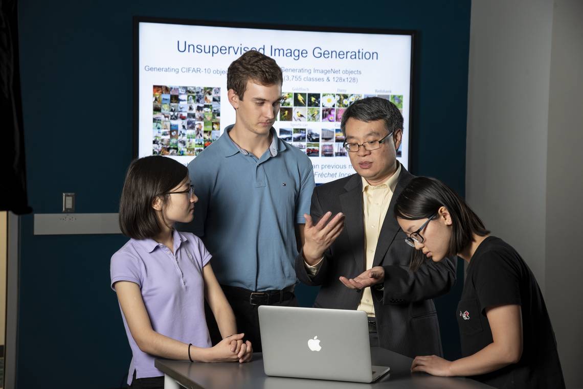 Professor Yiran Chen, second from right, and students. (Duke Photo)