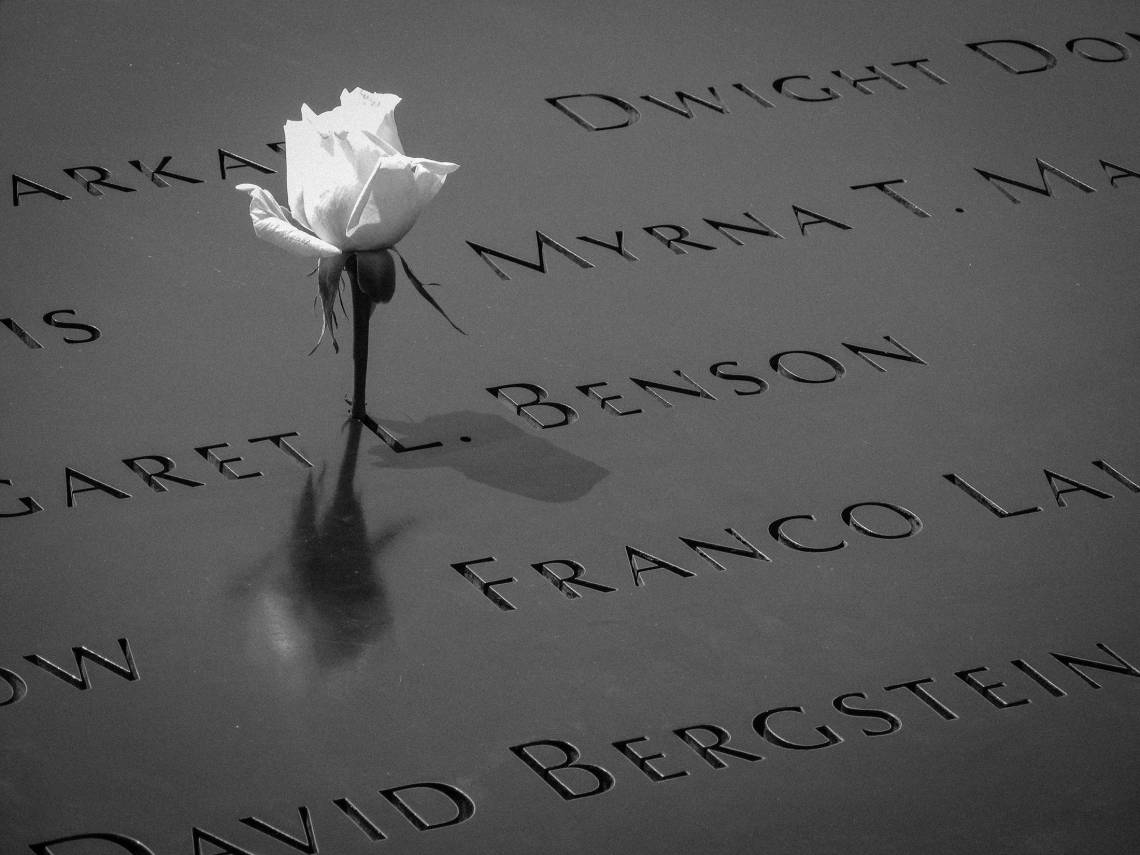 A rose at the 9/11 Memorial in New York City. Photo by Ben Lei via Unsplash.