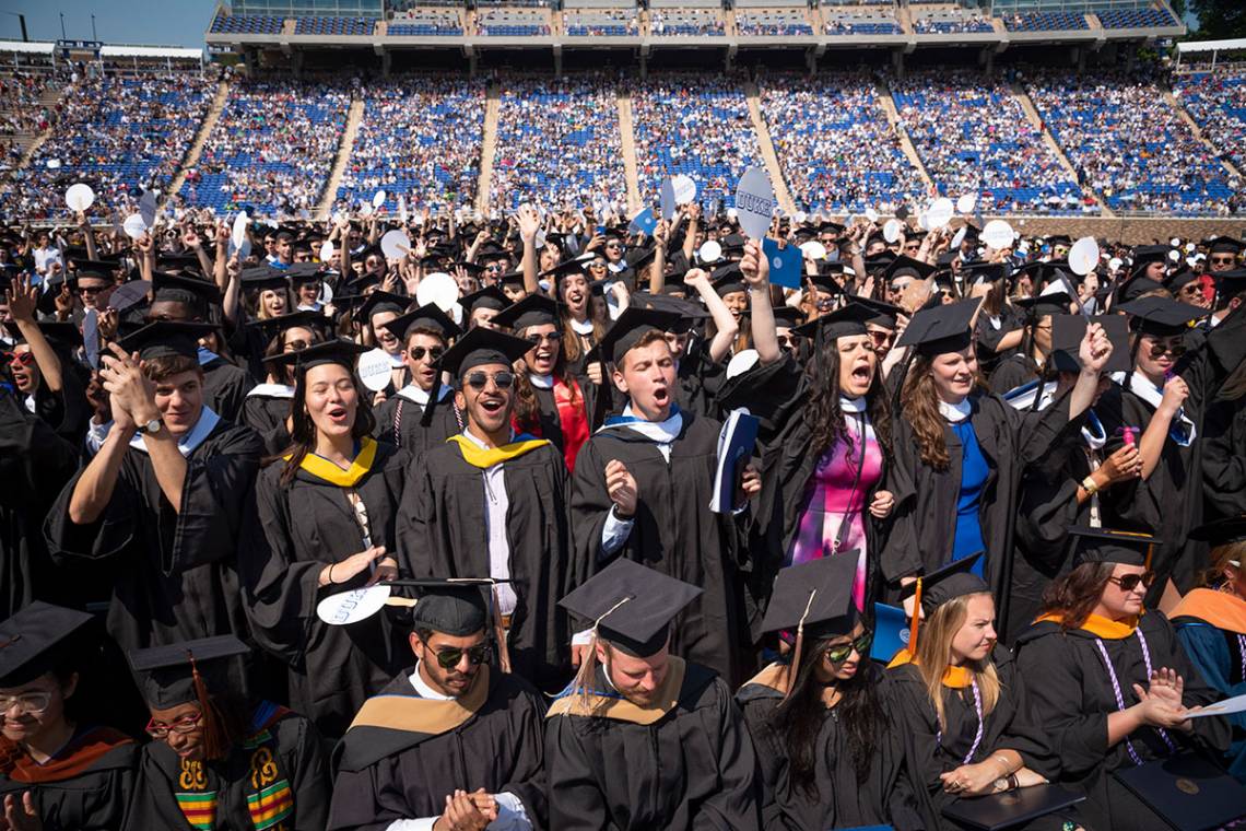 Students celebrate during commencement 2018 in Wallace Wade Stadium.