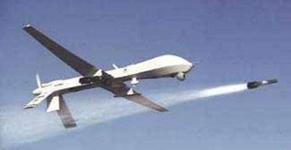 A Predator drone fires a Hellfire missile. Photo courtesy Wikimedia Commons