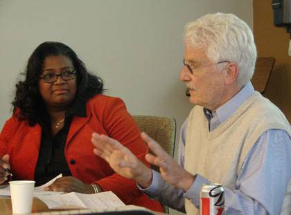 Phil Cook talks about his experiences in applying his gun research to public policy debates. Leoneda Inge of WUNC-FM moderated the discussion. Photo by Steve Hartsoe.