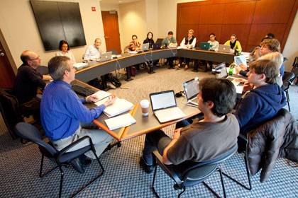 Ed Balleisen, top left, teaches a class on regulation in the law school. Balleisen is leading an effort to encourage faculty members to share ideas on teaching by sitting in each other's classes. Photo: Duke Photography