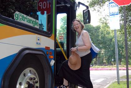 Kristina Troost boards a Triangle Transit bus on Chapel Drive for her afternoon commute back to Raleigh. 