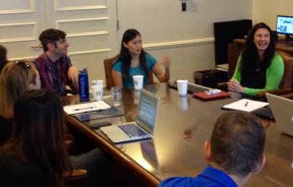 Duke students Jacob Tobia, left, and Rachael Nedrow, center, describe their success posting 