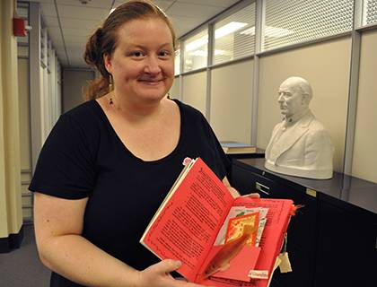 Amy McDonald, assistant university archivist, looks through some of the zines in Duke's collection. The zines can be read in the Rubenstein Reading Room in Perkins Library. Photo by April Dudash