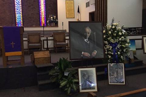 A photograph of William Pinkney's portrait of Julian Abele was on display at the memorial service for the artist. Courtesy Ben Reese