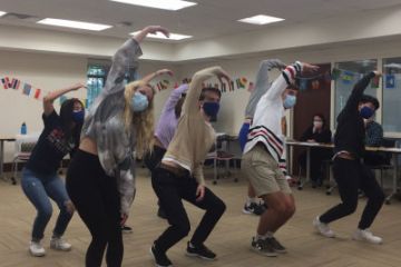 Students in Vliches’ class act out dialogue from “Life Is a Dream” on October 18, 2021. (Margo Lakin/Trinity Communications)