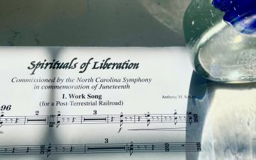 Spirituals of Liberation, shown here with part of the sheet music, will be premiered on June 18 by the NC Symphony. Photo courtesy of Anthony Kelley.