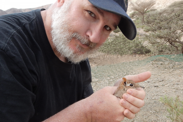 Steven Heritage holds one of the rediscovered Somali Sengis in the field in Djibouti.